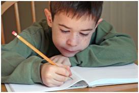 child with doing homework for school