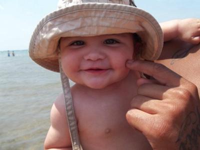 Boy at beach photo contest for kids winne