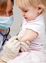 child receiving vaccines that parents are afraid may cause autism
