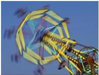 blurry picture of a ferris wheel indicating potentially having vestibular dysfunction