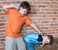 children displaying behavior disorders by fighting