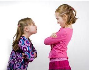Two children modeling bad behavior and attitude