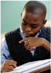 A child writing in order to improve concentration