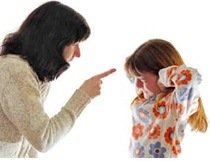 A mother scolding a child with oppositional defiant disorder