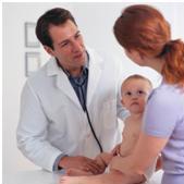 doctor with mom and baby during check up to rule out early signs of autism in infants